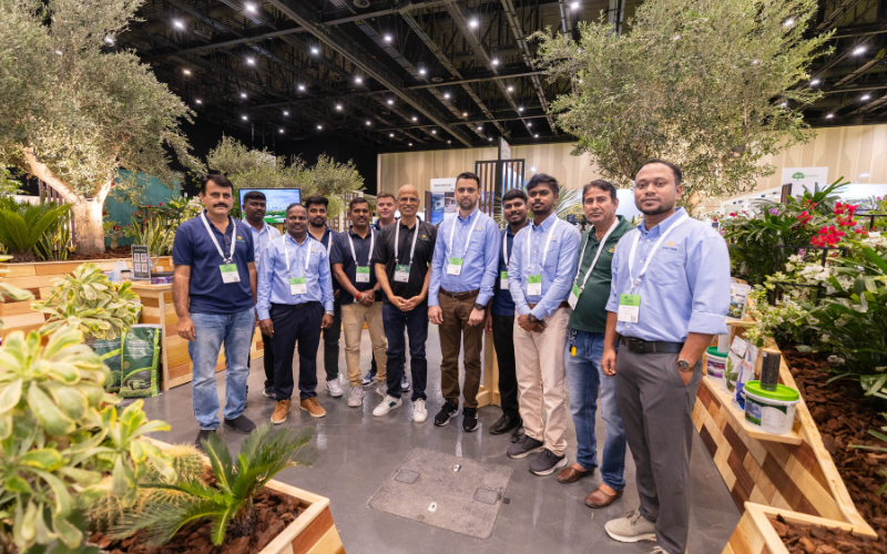 Desert Group team at My Plant & Gardens Expo inside in-house pallet wood stand with Plantscapes design and Wahat plants