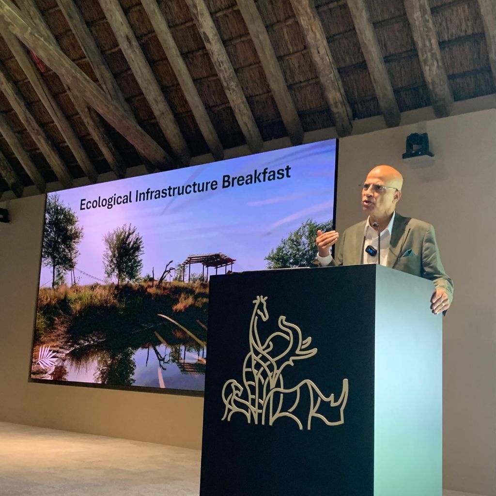Speaker presenting water management systems and ecological infrastructure strategies at Sharjah Safari.